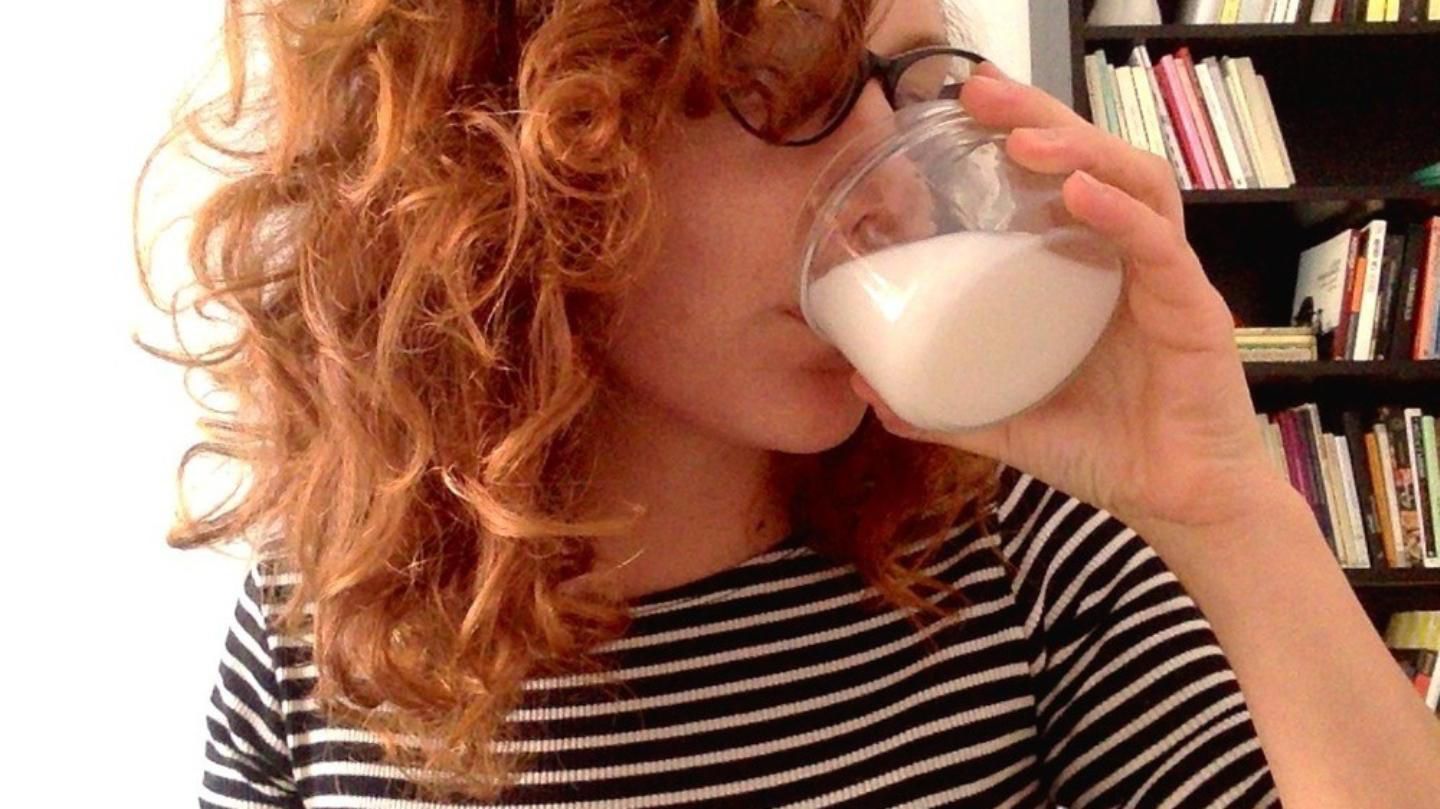 Drinking milk from leaking teen