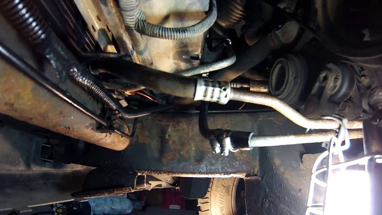 350 chevy motor leaking tranny fluid